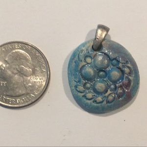 Aromatherapy clay fired pendant